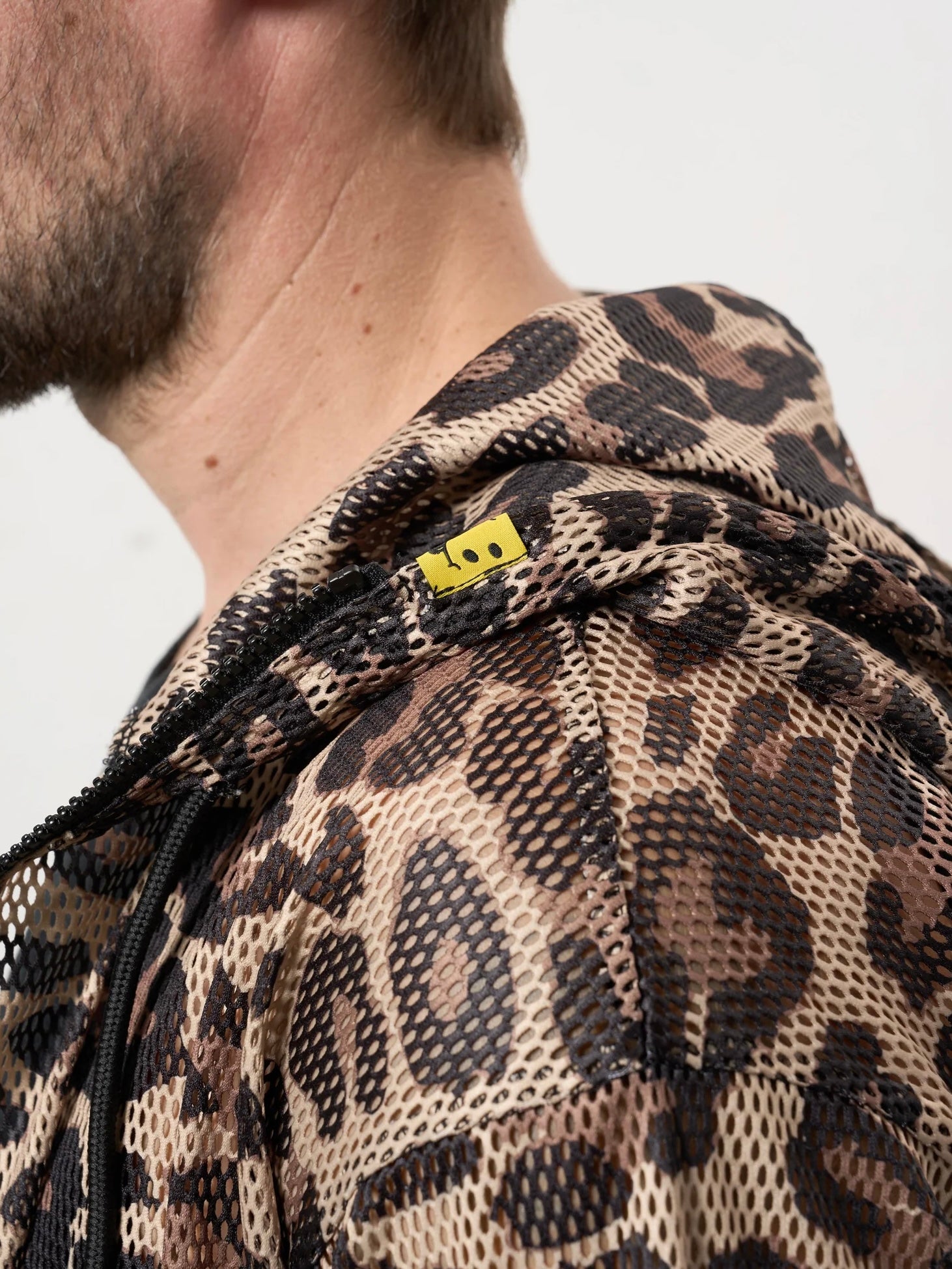 レオパードメッシュ スマイリーパッチ ジップパーカー